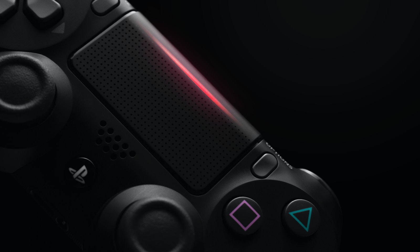 black Sony PS4 wireless controller